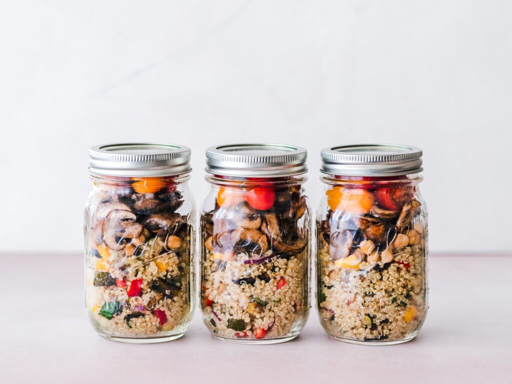 quinoa salad with mushrooms in mason jars 